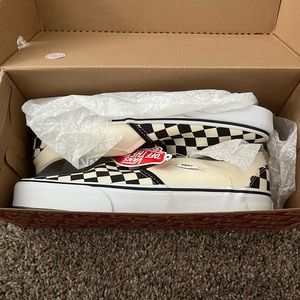 Vans checkered slip ons